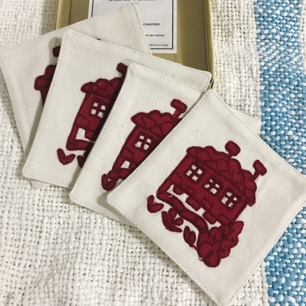 Williams Sonoma hand stitched crewel coaster set